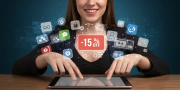 Save Up to 15% Annually: Auto-Renewal Discounts 2025 Subscriptions Person smiling while managing subscriptions on a tablet, showing a 15% discount notification.